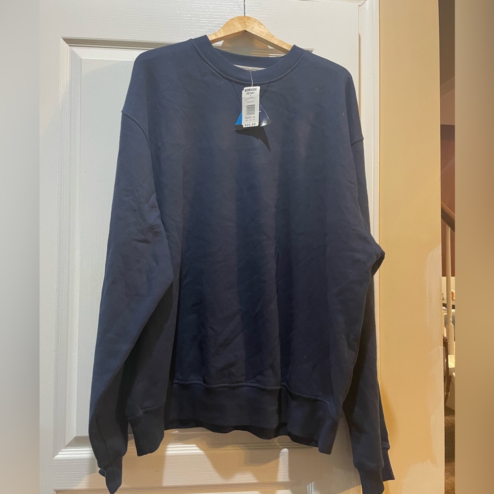New with tags Champion navy sweatshirt. Size 2XL